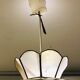 Suspension fleur nacre et laiton