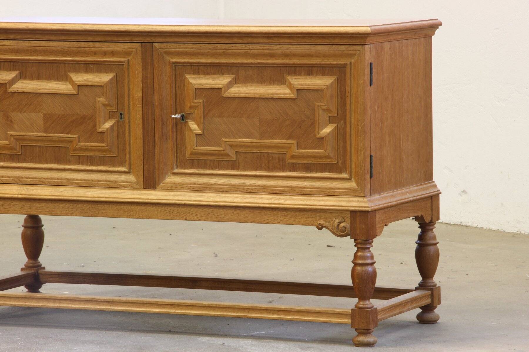 Vintage low sideboard in oak by Henning Kjærnulf, 1960s