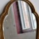 Antique gilded baroque mirror in wood – Distressed glass – Carved wood