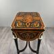 Writing table in Napoléon III style with marquetry and gilded bronzes, 19th century.