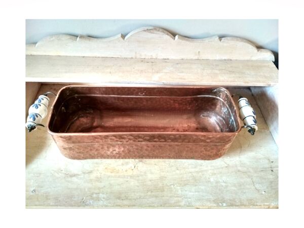 Grande  jardinière en laiton et cuivre,  bac  sur 4 pieds pattes de lion