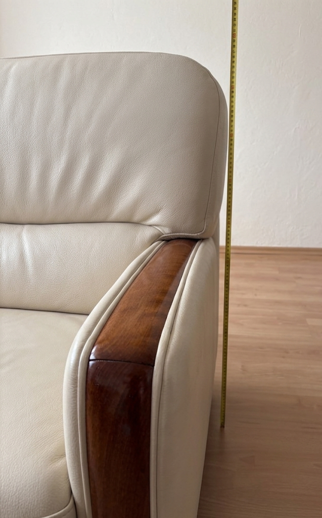 Beige leather sofa with solid wood frame