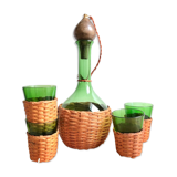 Service carafe and vintage glasses, with wicker