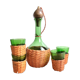 Service carafe and vintage glasses, with wicker