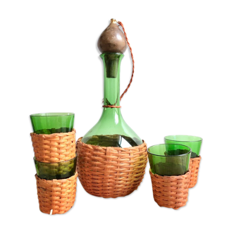 Service carafe and vintage glasses, with wicker