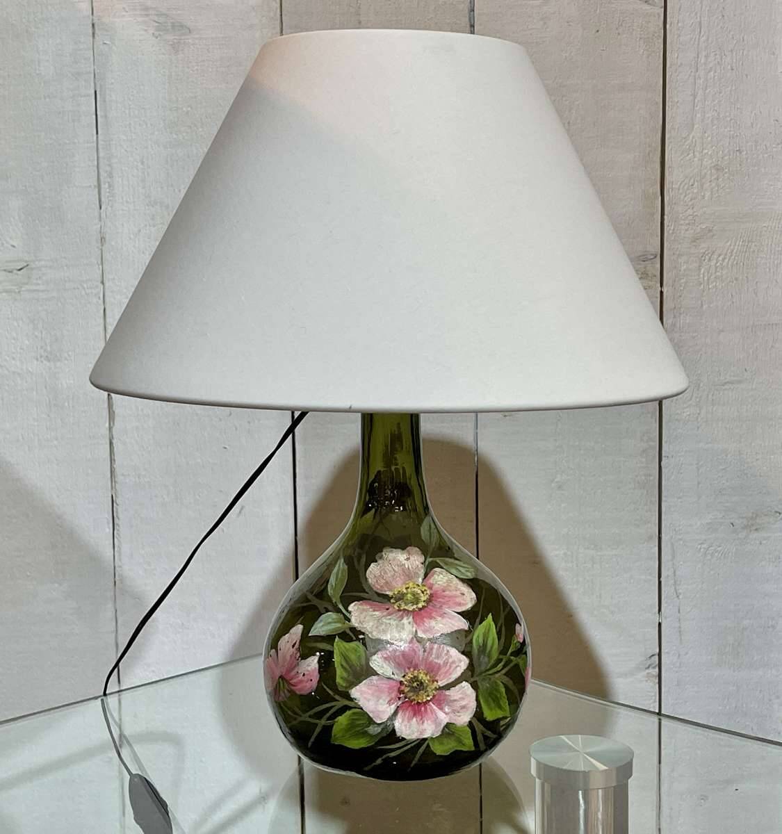 Blown glass lamp painted with a floral design, early 20th century.