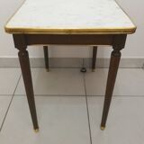 Pull-out tables on marble