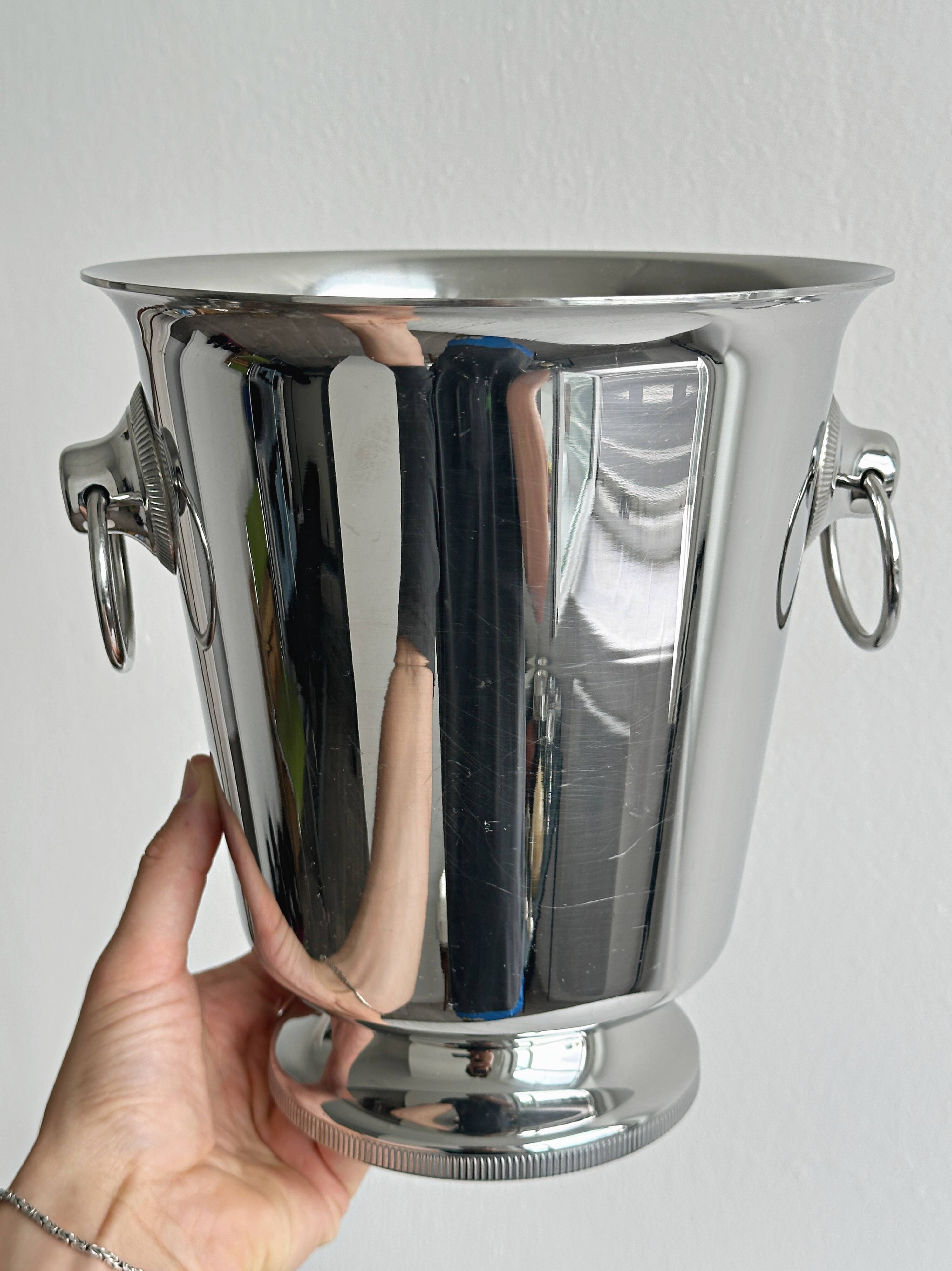 Shiny stainless steel champagne bucket
