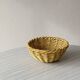 Yellow ceramic basket with wicker effect