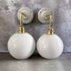 Pair of vintage white opaline wall lights