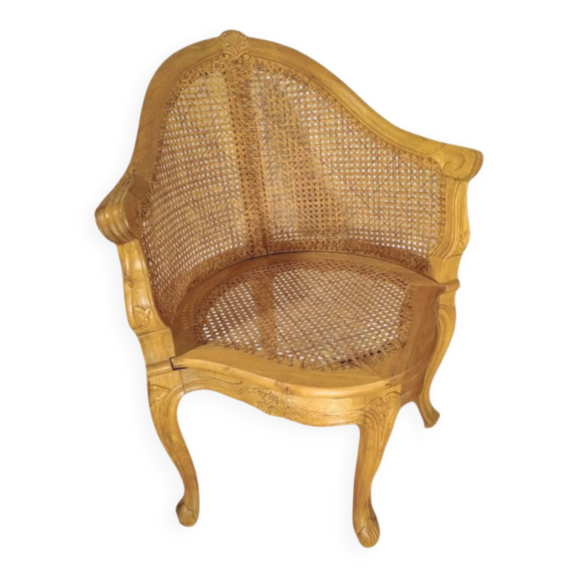Armchair in solid oak with caning and a central leg (known as couillard), 89x68cm.
