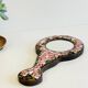 Miroir à main métal emaillé sur bois vintage