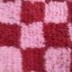 Handmade pure wool rug in traditional pink and red, 150/250 cm.