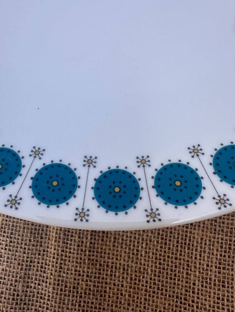 Vintage Thomas Germany flat plates, geometric blue rosette design.