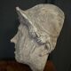 Antique plaster sculpture of a female face from the early 20th century