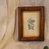 Wooden frame and gilding, laurier linen