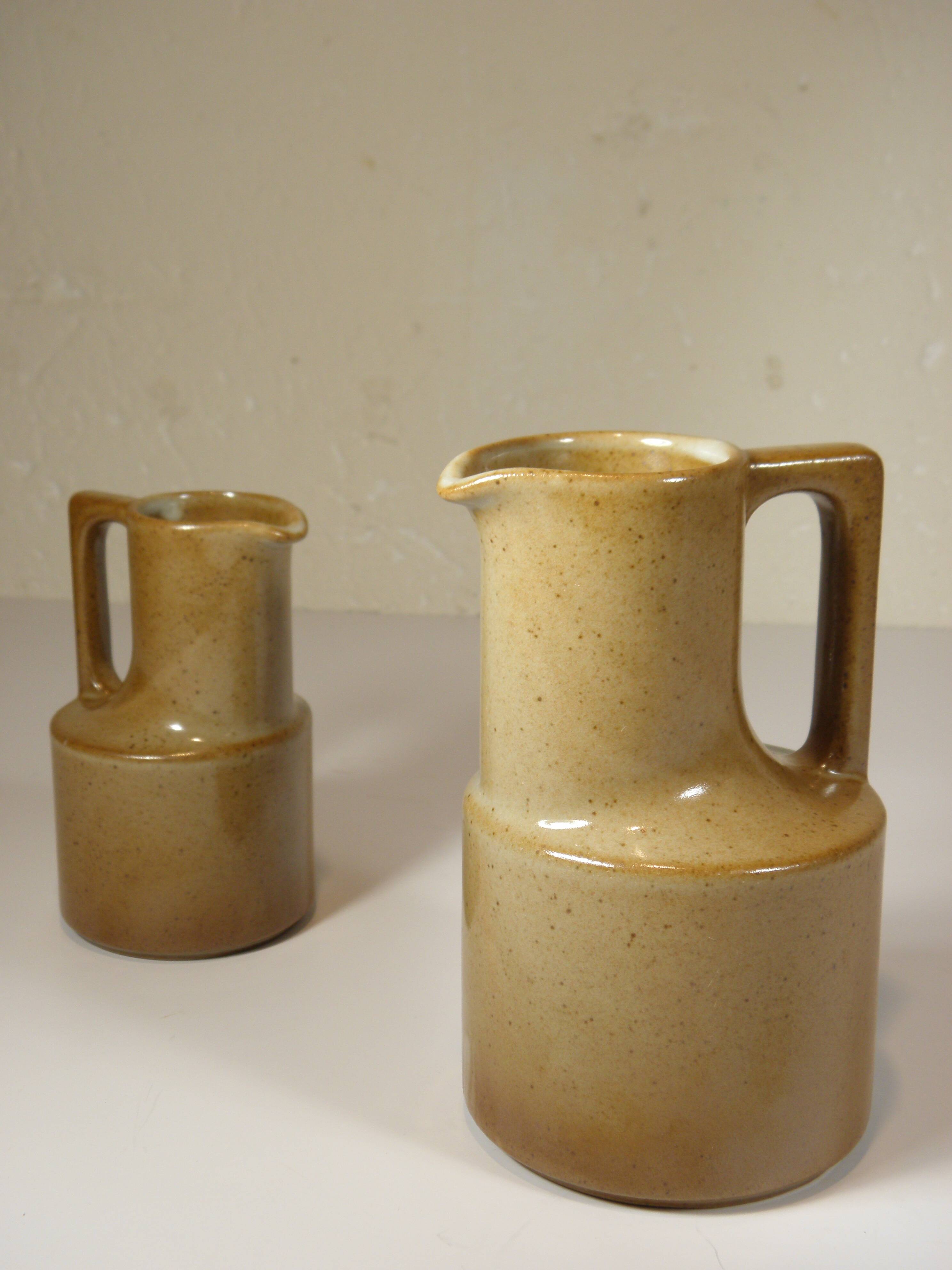 TWO STONEWARE jugs from Brenne