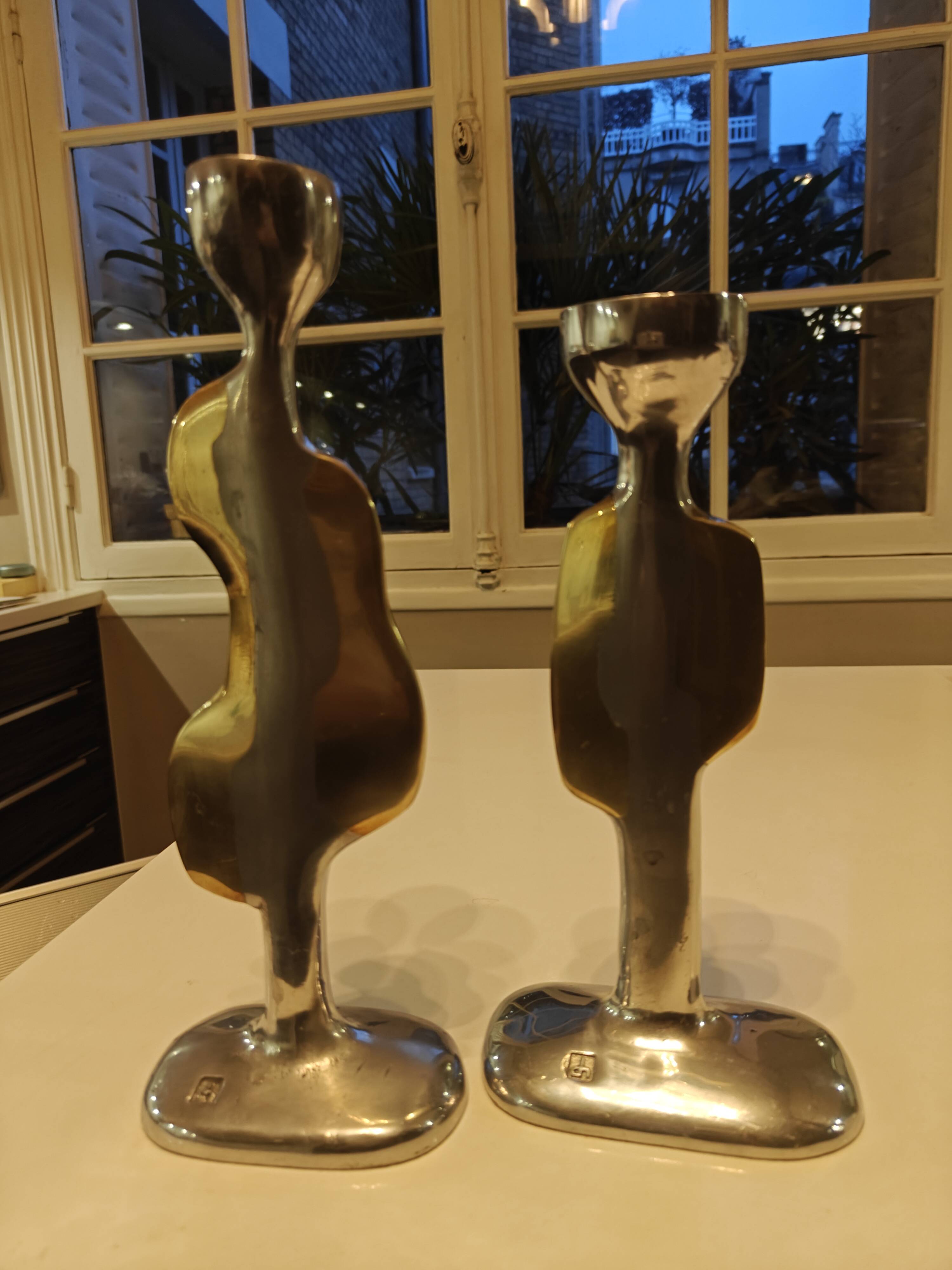 Pair of large candlesticks by David Marshall