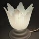 Art Deco style 1960s bedside lamp in molded and granite glass.