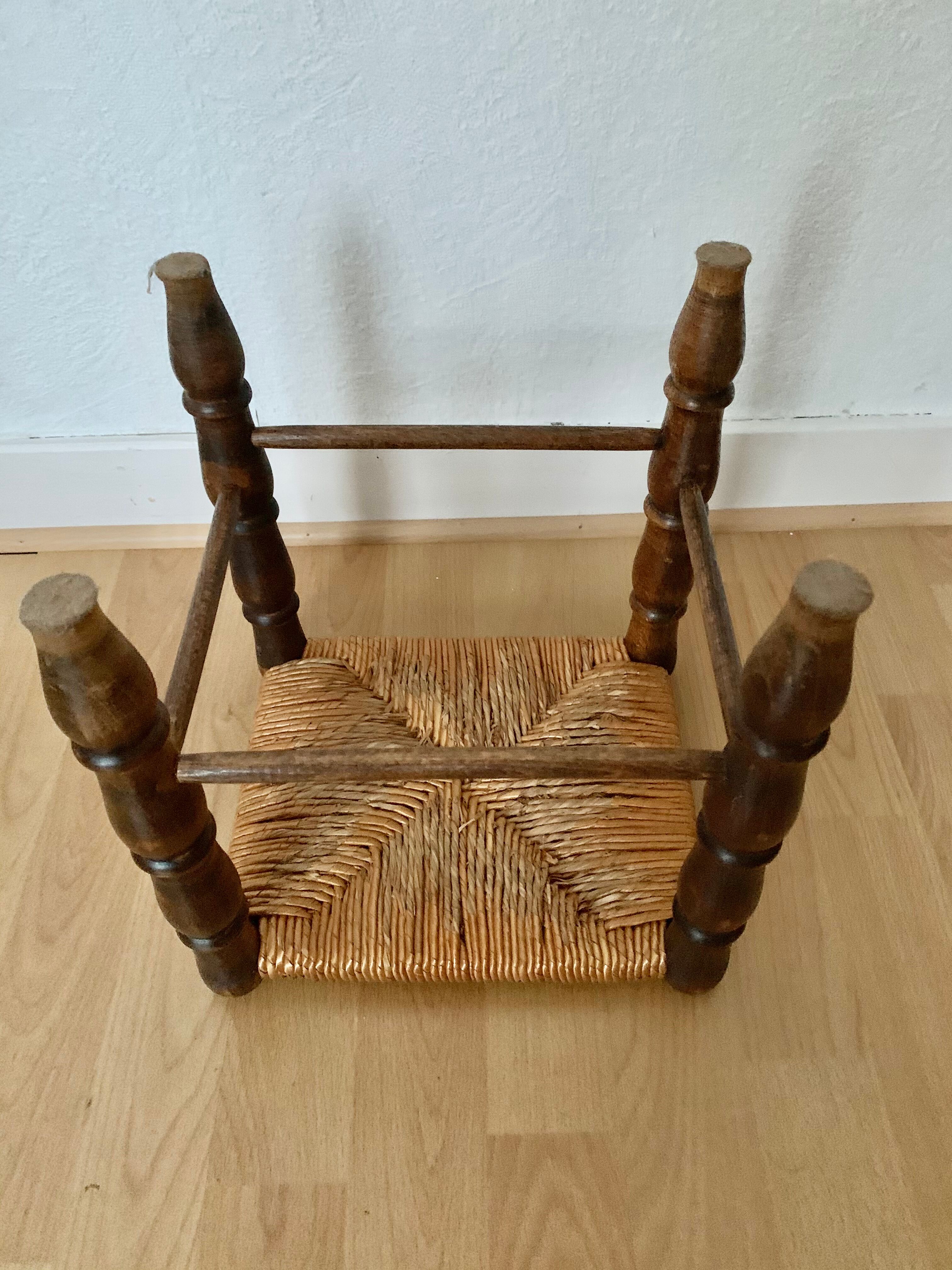 Rests foot wooden stool and wicker