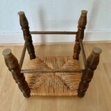 Rests foot wooden stool and wicker
