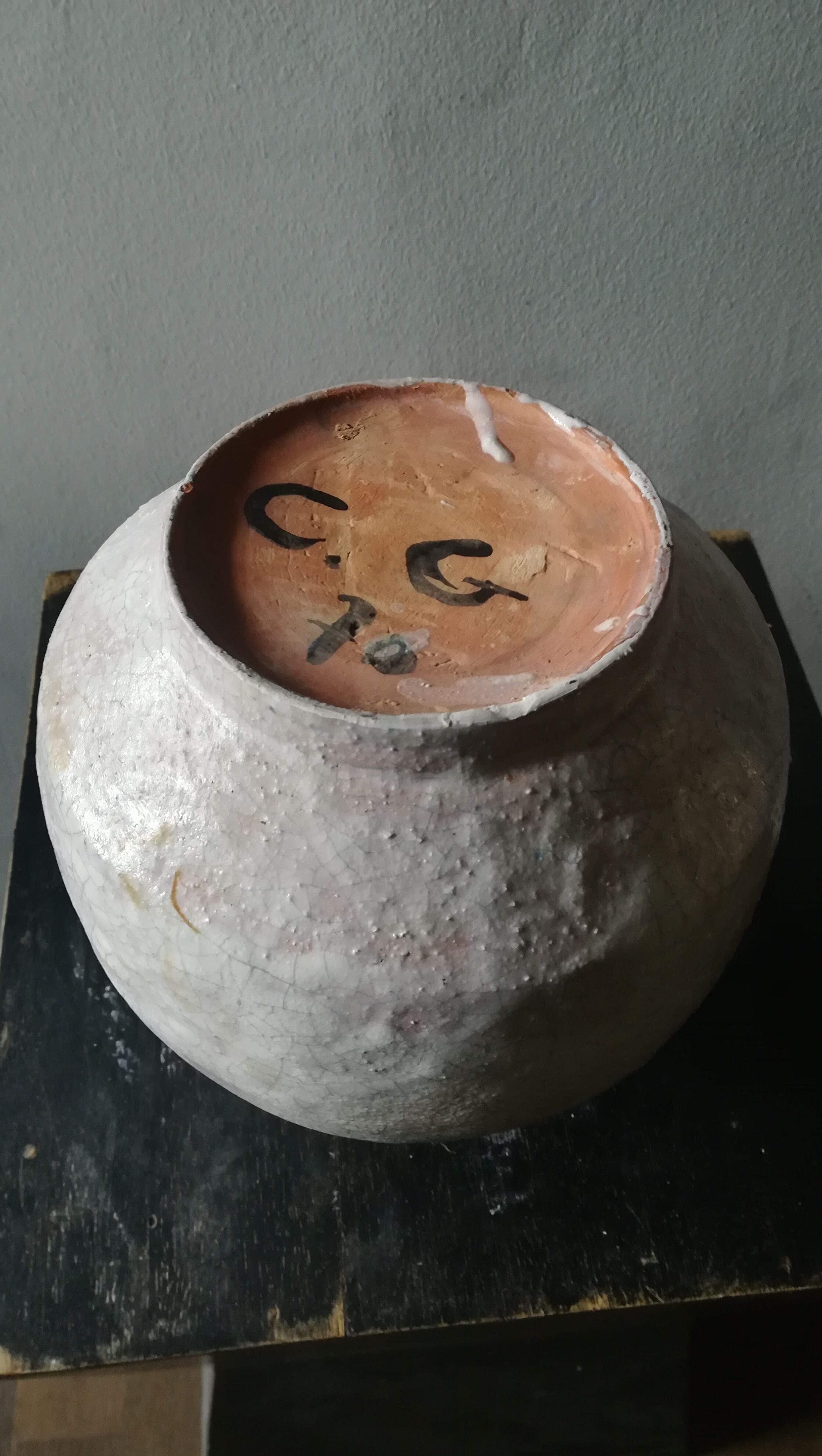 Vase covered white crusty and cracked ceramic,