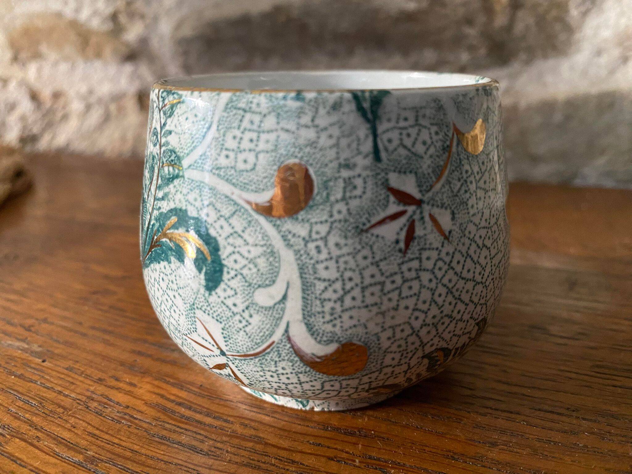 Creil et Montereau cup and saucer green and gold floral pattern