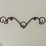 Vintage wrought iron wall coat rack