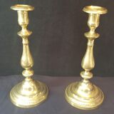 Chiseled gilded metal candlesticks