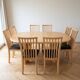 Skovby dining table and 8 vintage Scandinavian style wooden chairs.