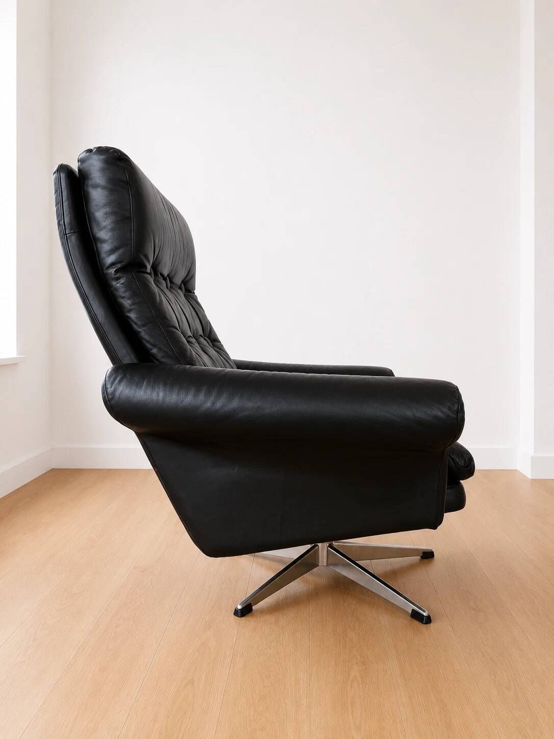 Vintage Danish mid-century black leather swivel chair 1970s