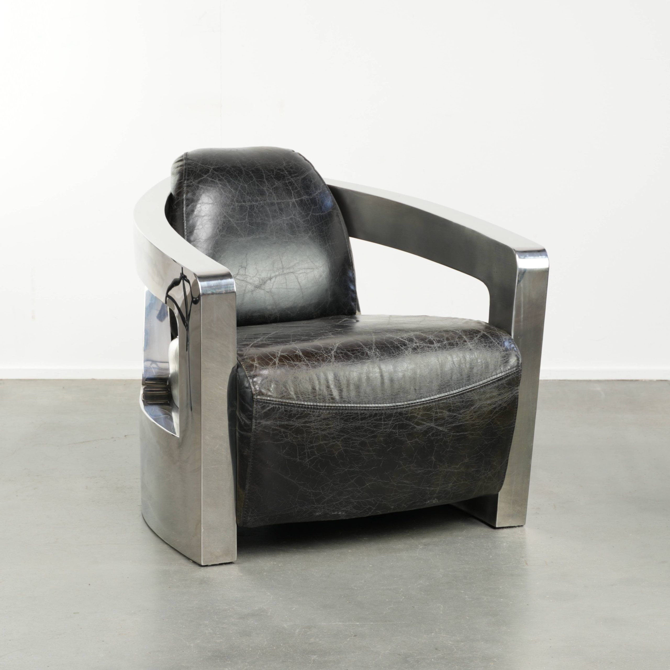 Vintage aviator design armchair in cowhide leather with aluminium