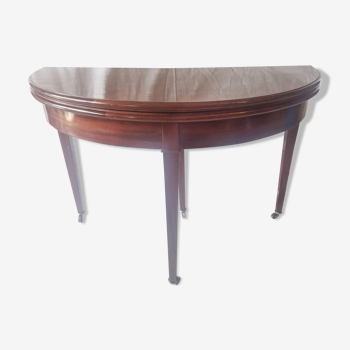 Mahogany game table and mahogany veneer, rolling half-moon console or round table.