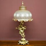 Table lamp with a tall base.