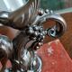 Zinc art bookends in the shape of birds on red marble - warblers