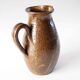 Beautiful pitcher in speckled sandstone