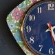 Vintage formica clock silent asymmetrical wall pendulum "Blue purple green flowers"