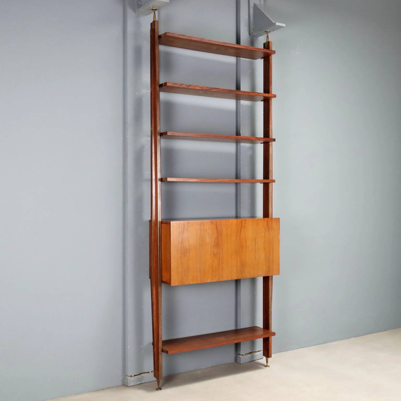 Vintage library from the 1950s-60s with a bar compartment.