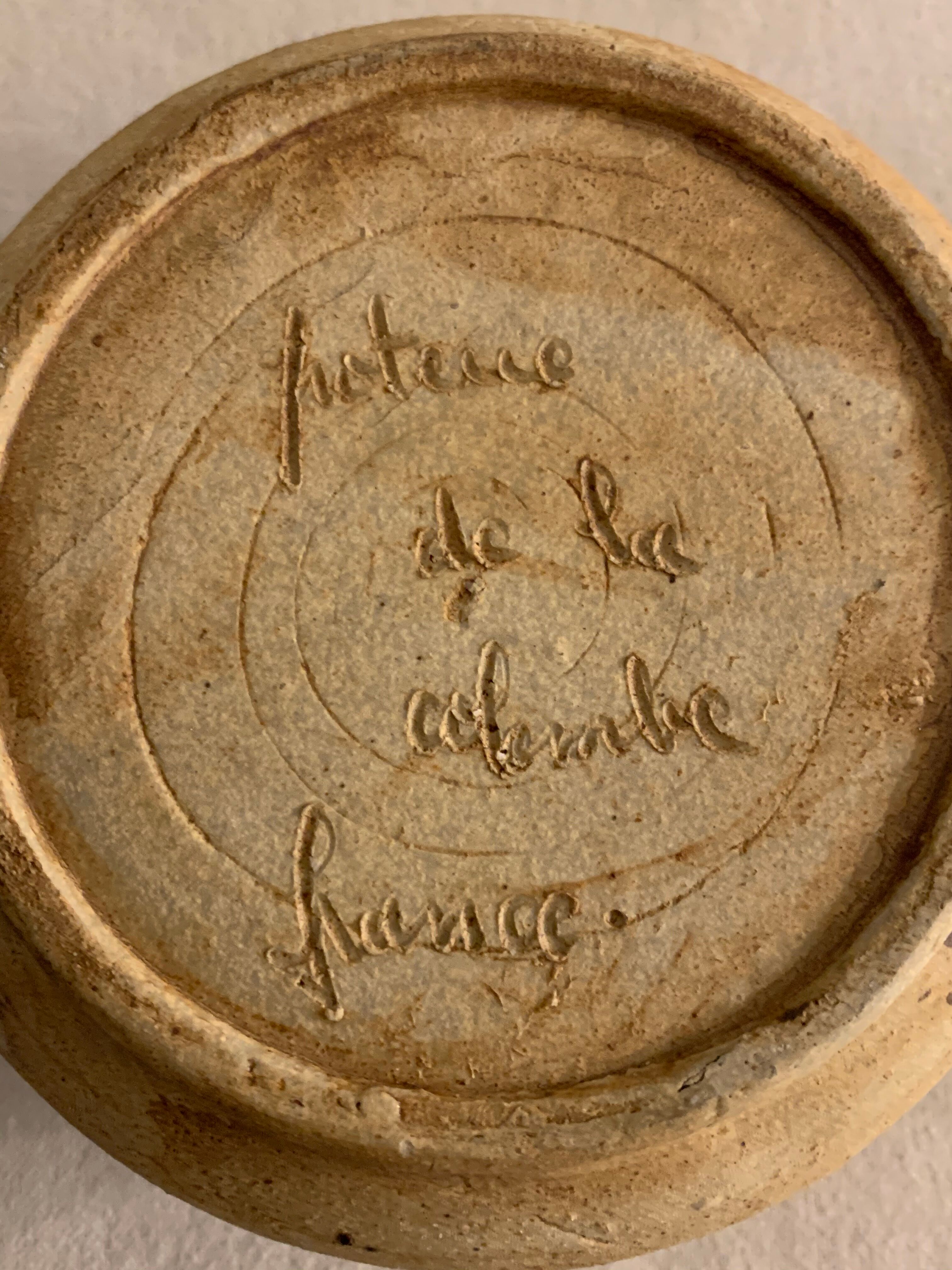 Ancient pot and its lid Pottery of the Dove in sandstone 1975