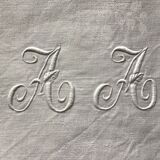 Tablecloth and 12 linen towels marked AA