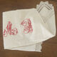Antique white cotton pillowcase with crochet and monogram.