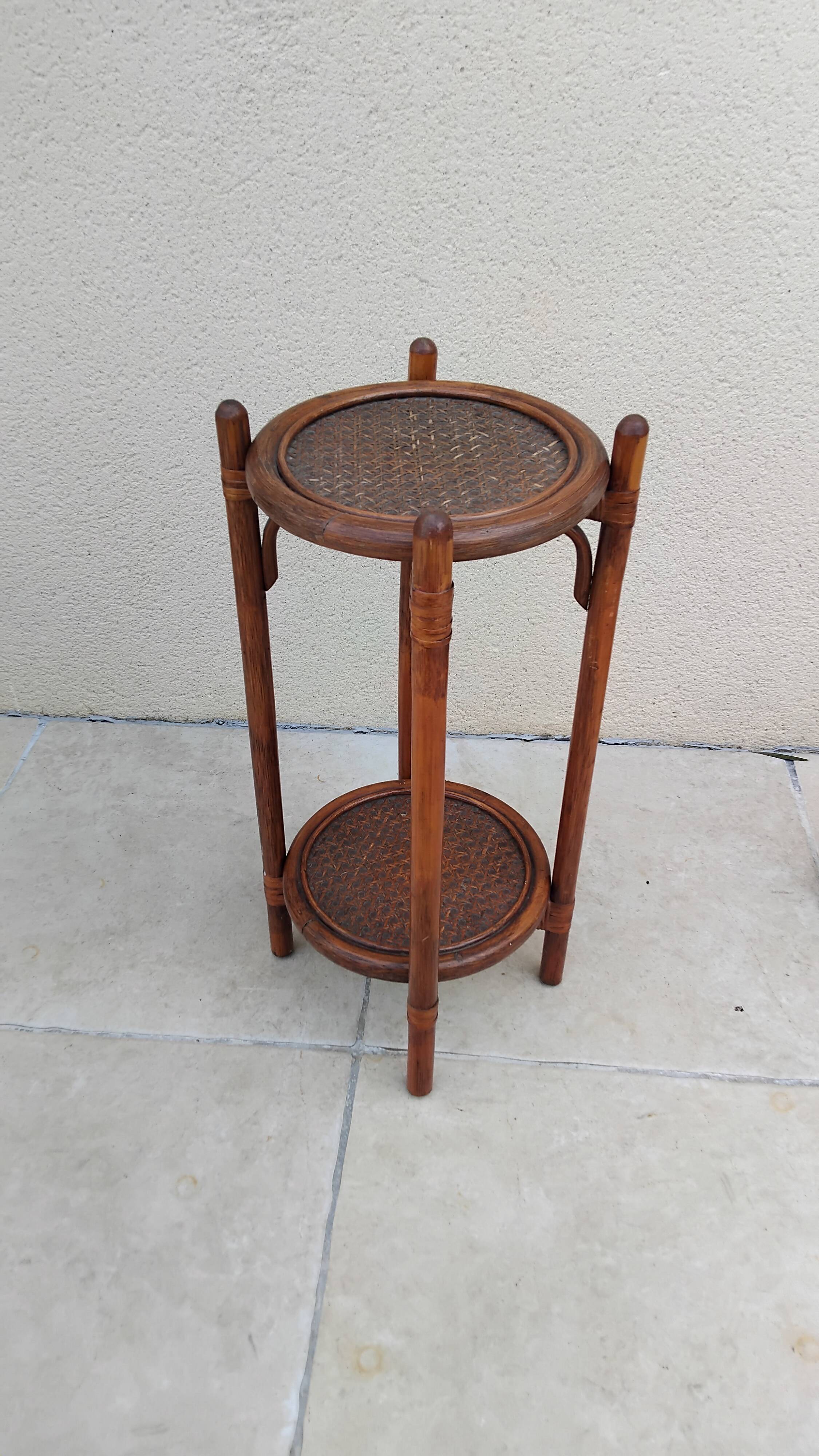 Vintage folding wooden and wicker side table.