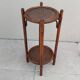 Vintage folding wooden and wicker side table.
