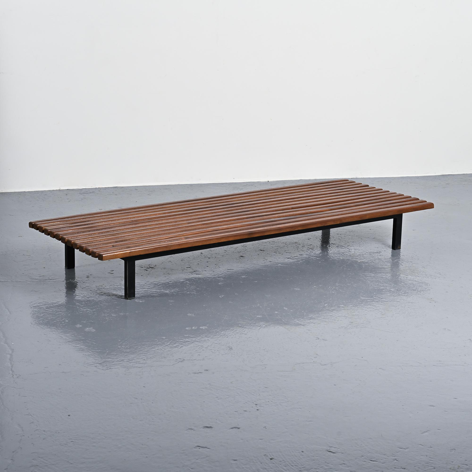 Cansado bench in mahogany by Charlotte Perriand, circa 1962.