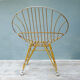 Chaise corbeille jaune en métal années 50