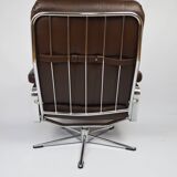 A pair of leather armchairs, 1970s