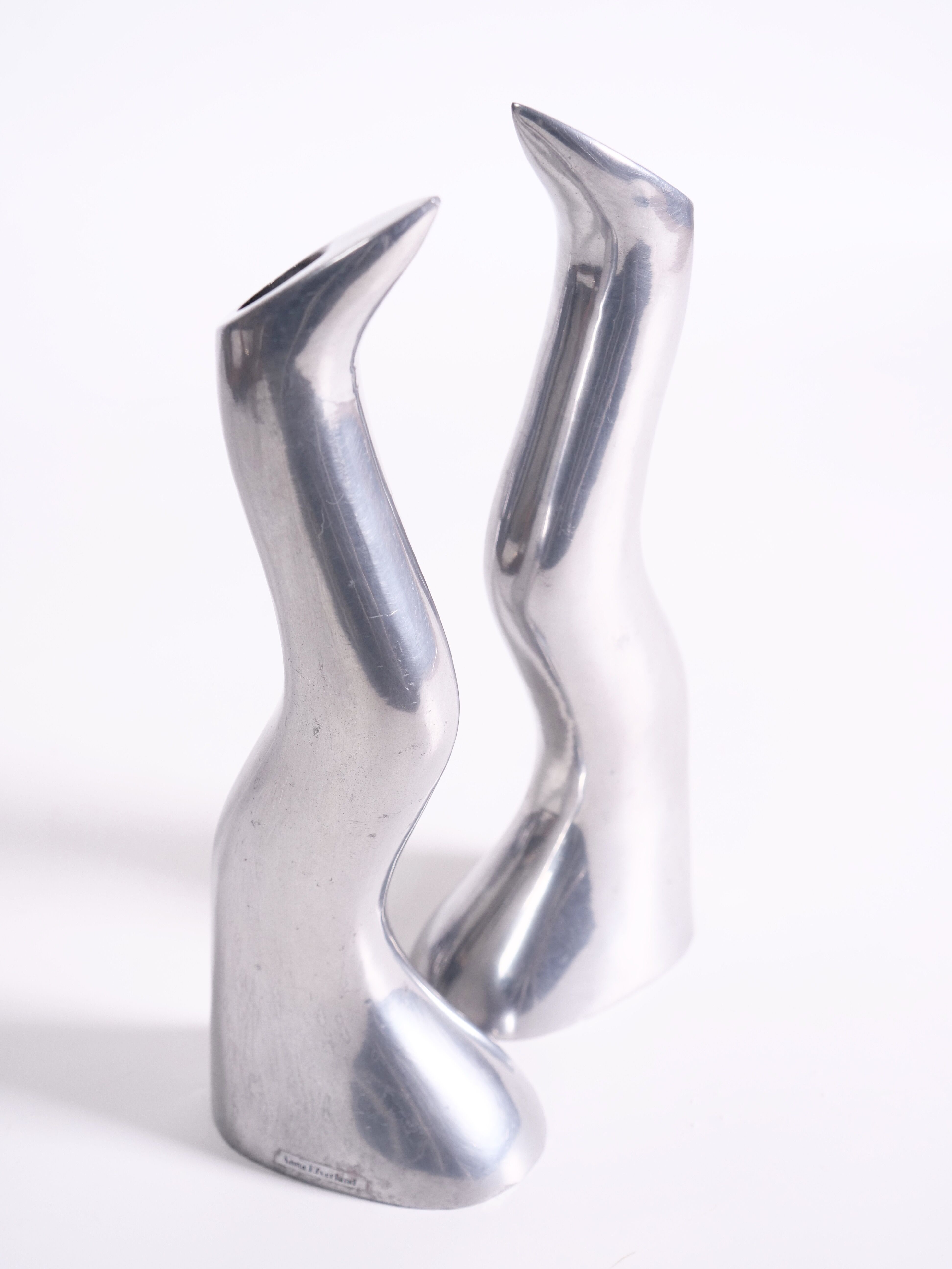 Pair of cast aluminum candle holders by Anna Efverlund