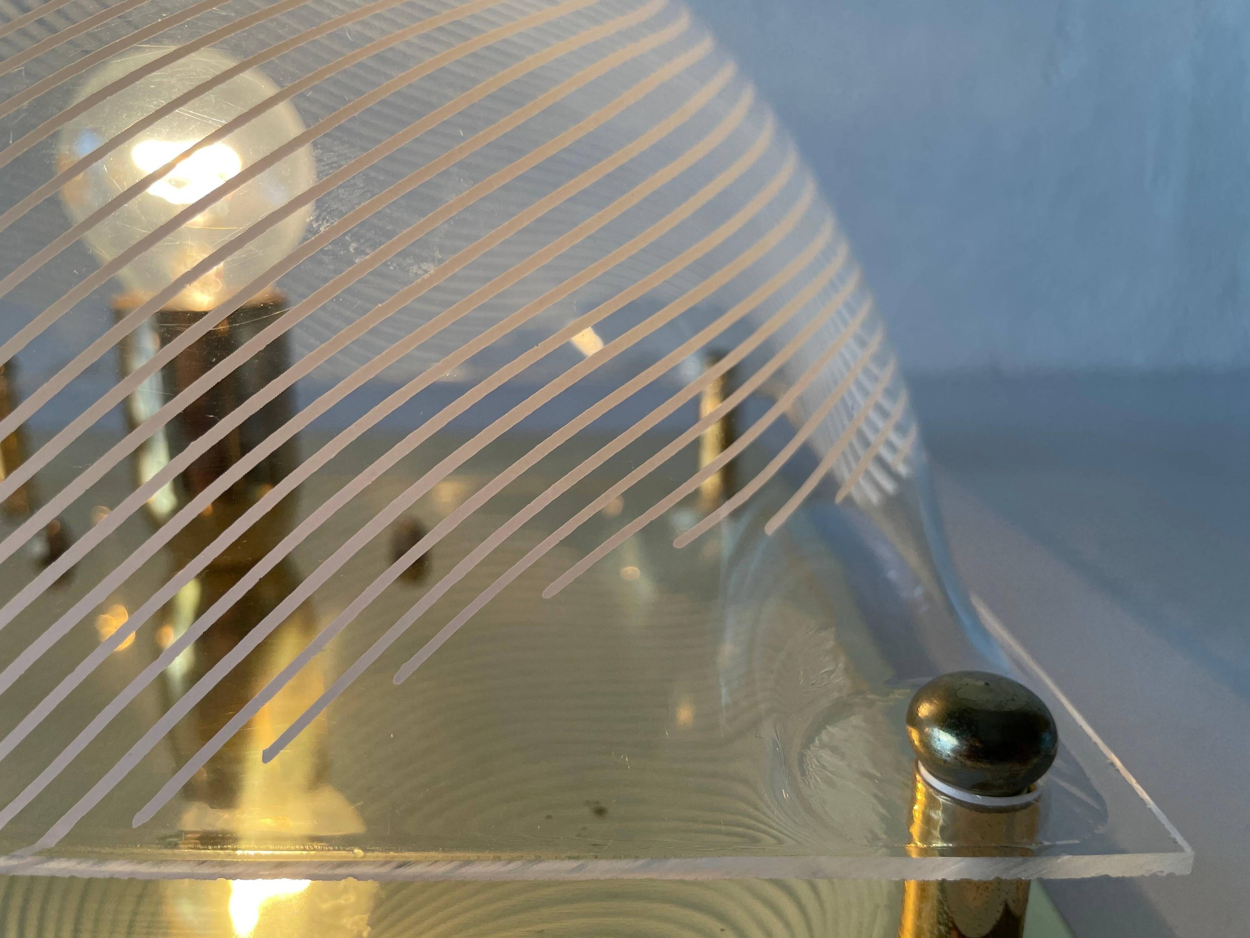 Pair of wall lights or flush mounts in plexiglass by Leola, 1970s, Germany.