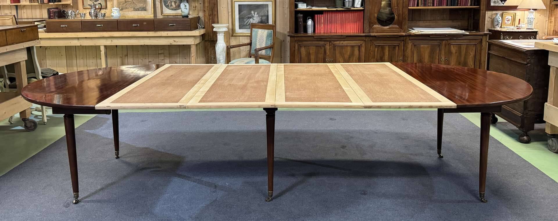 19th-century Louis XVI dining table in Cuban mahogany.