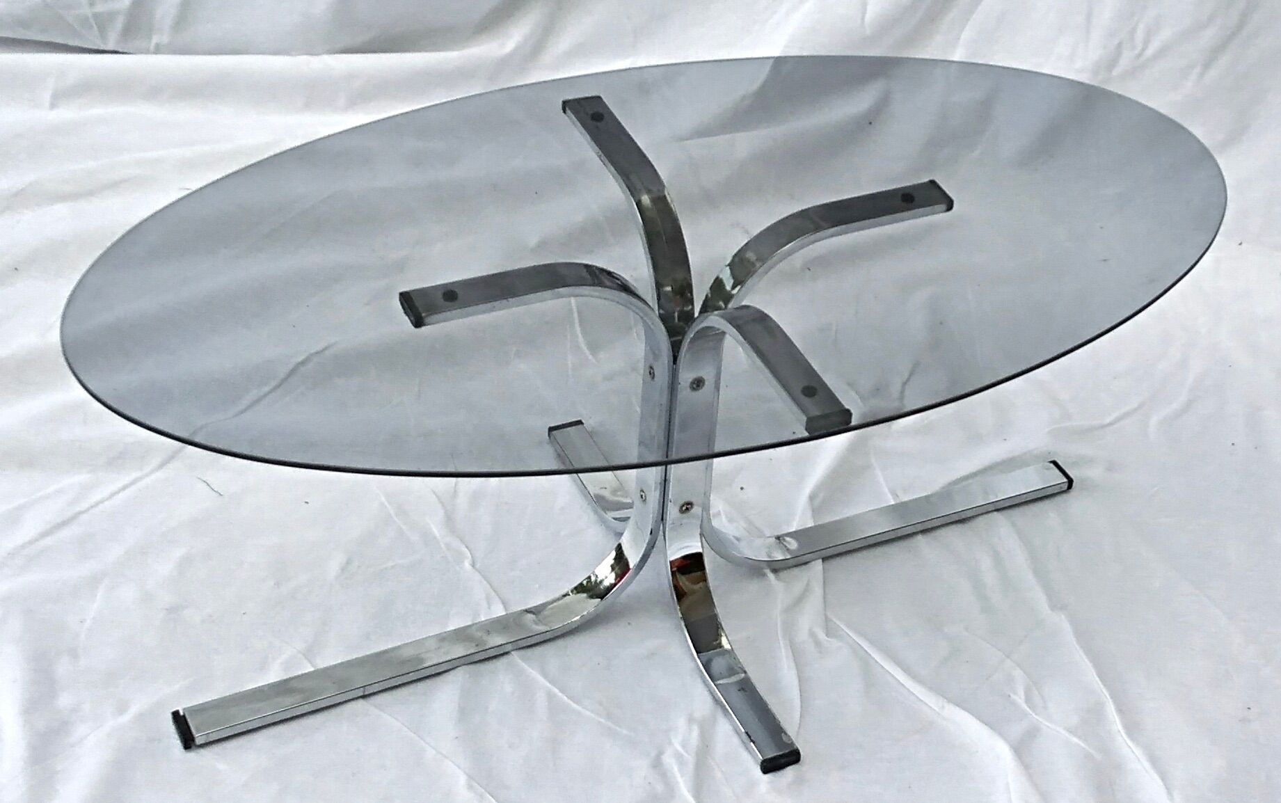 Oval glass coffee table smoked glass chromed metal